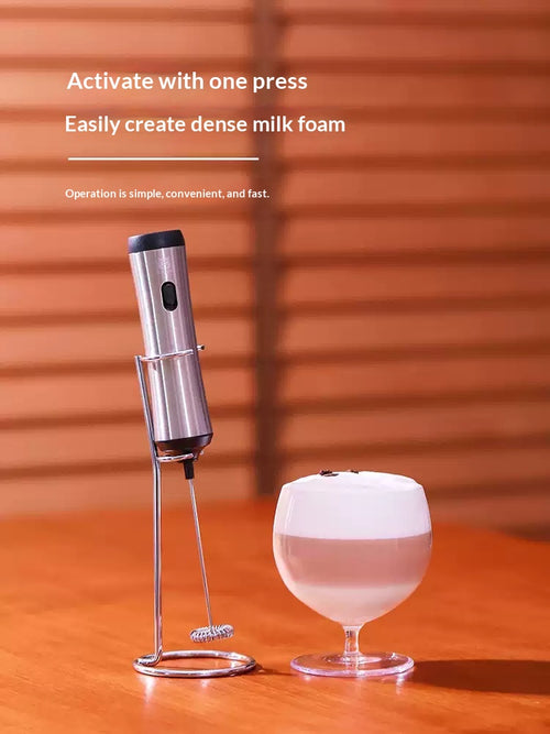 Handheld electric milk frother