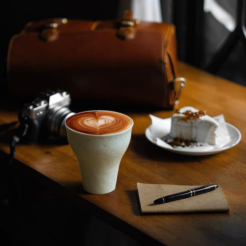 Ink-splashed ceramic latte mug