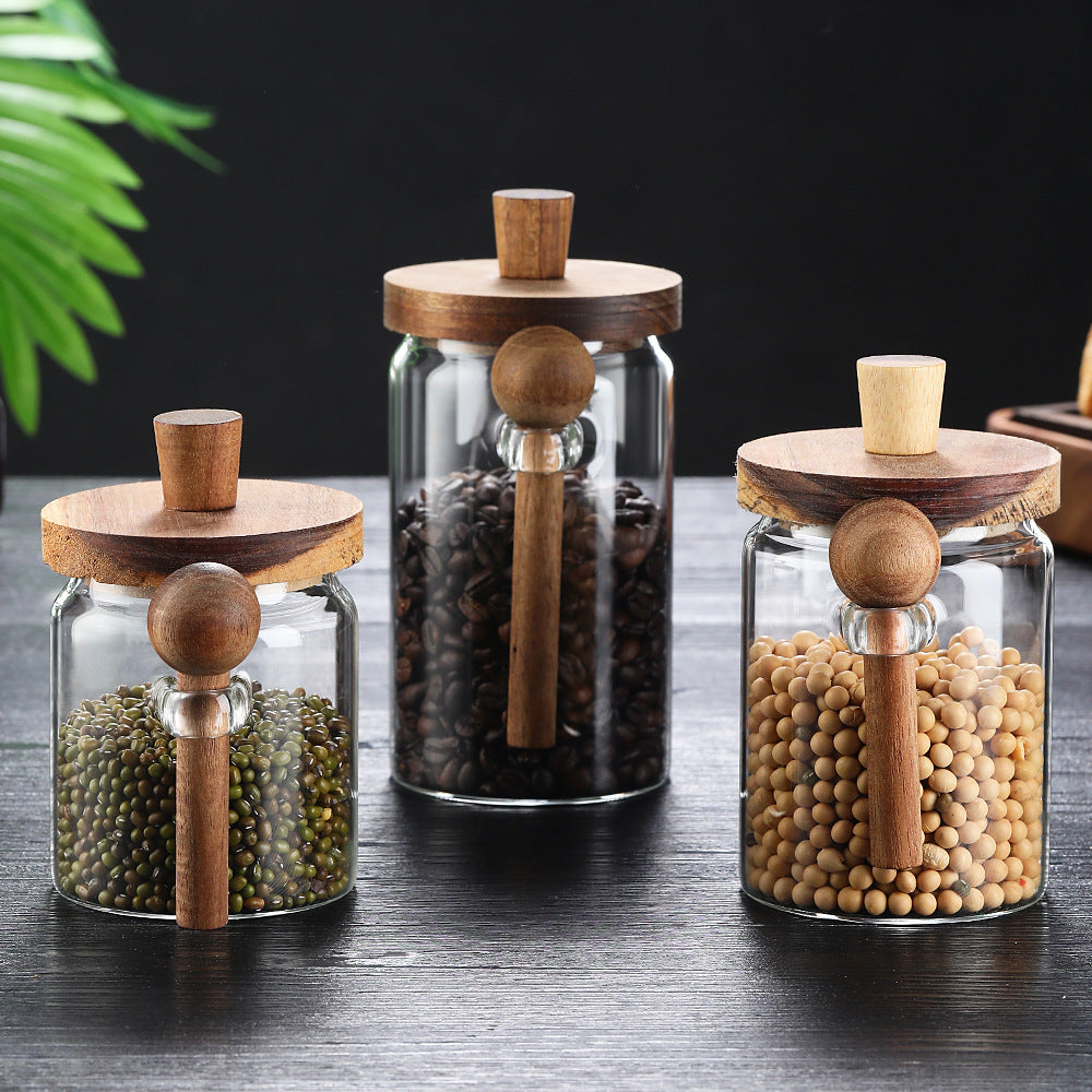 Glass storage jar set with wood spoons